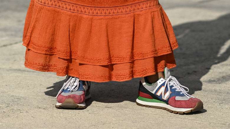 Woman wearing color block sneakers