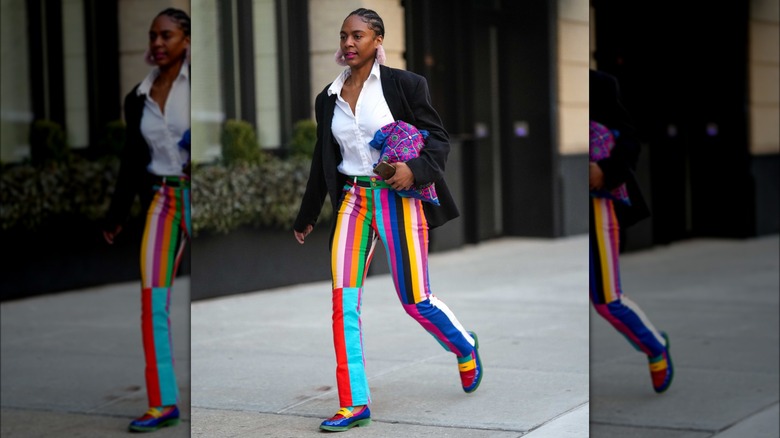 woman wearing rainbow loafers