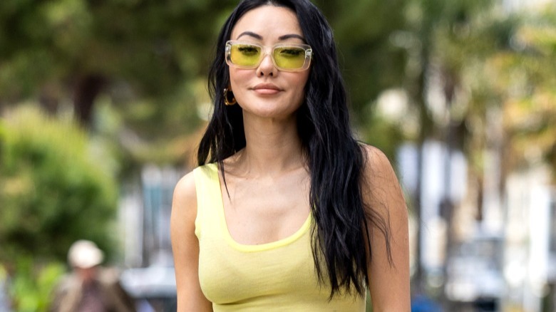 Jessica Wang wearing yellow sunglasses