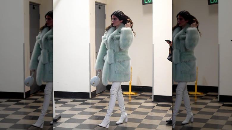 Kendall Jenner wearing a mint faux-fur jacket