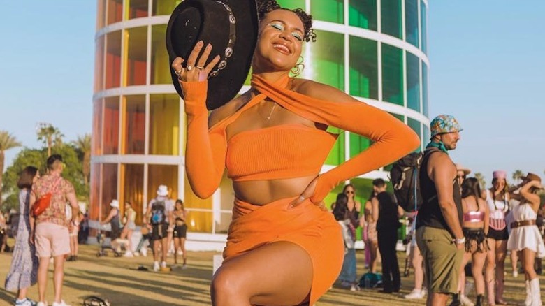 Woman wearing orange matching set
