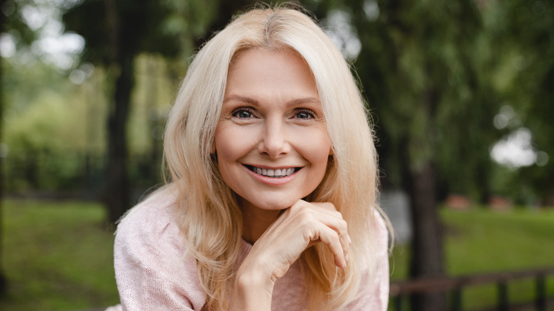 Middle-aged woman with platinum-blond hair