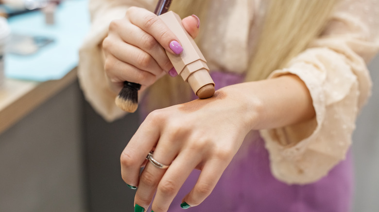 A woman testing out contour