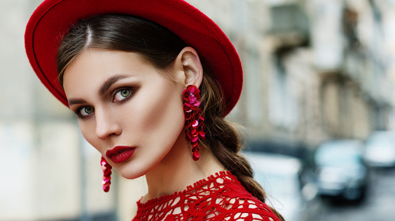 Dramatic woman with red hat and lipstick