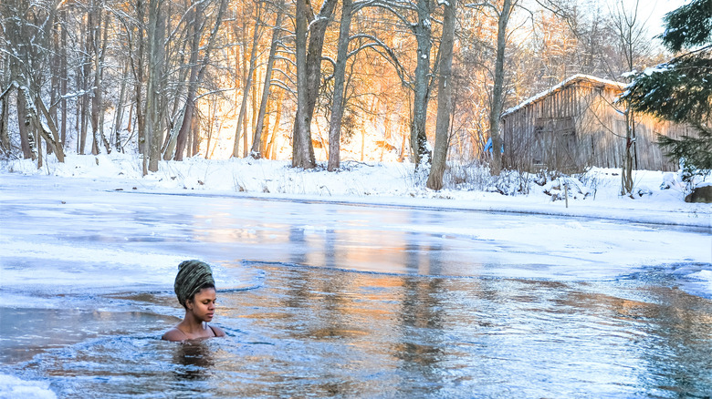 Woman bathing in icy water