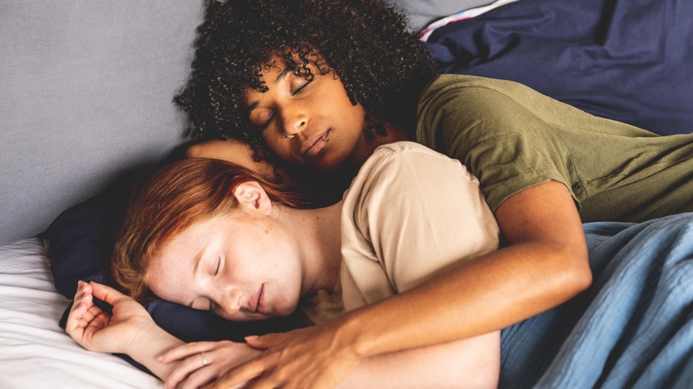 Lesbian couple sleeping together