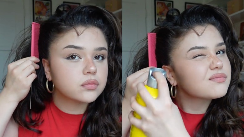 Woman styling hair with hairspray