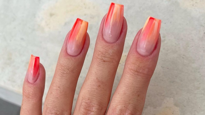 Coral shades manicure