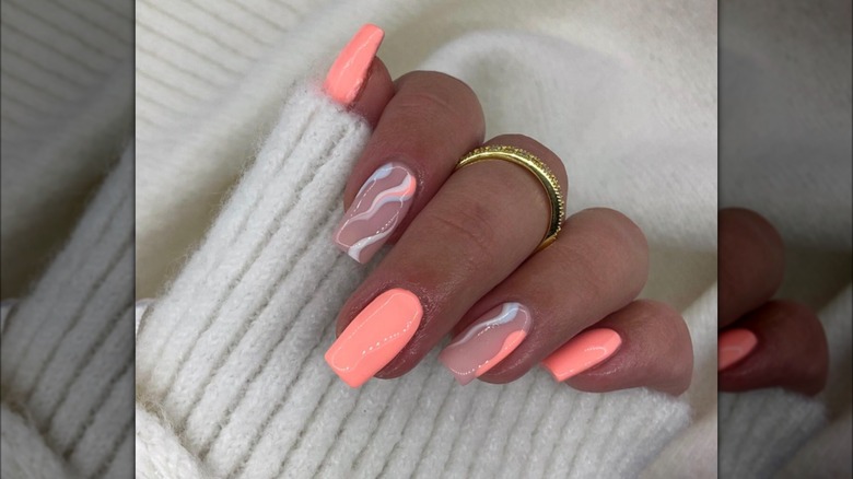 Coral nails with wavy designs