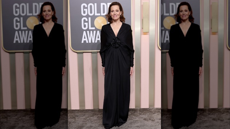 Sigourney Weaver black dress at the 2023 Golden Globes