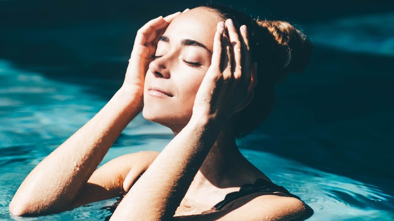 woman in a pool spa