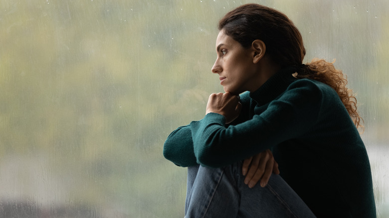 woman sitting alone