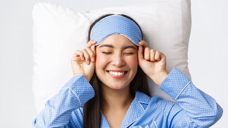 woman with eye mask