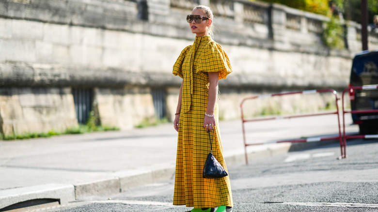 woman wearing plaid dress