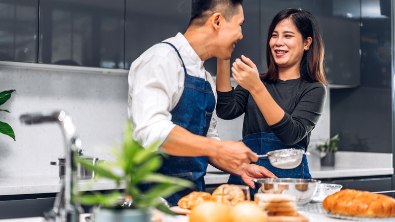 Couple cooking together