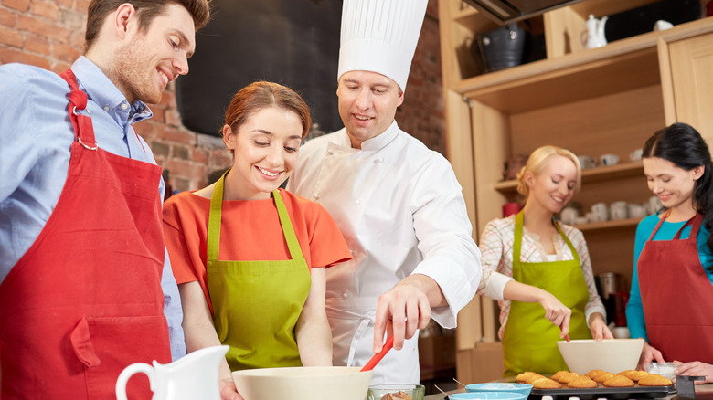 Couple in cooking class