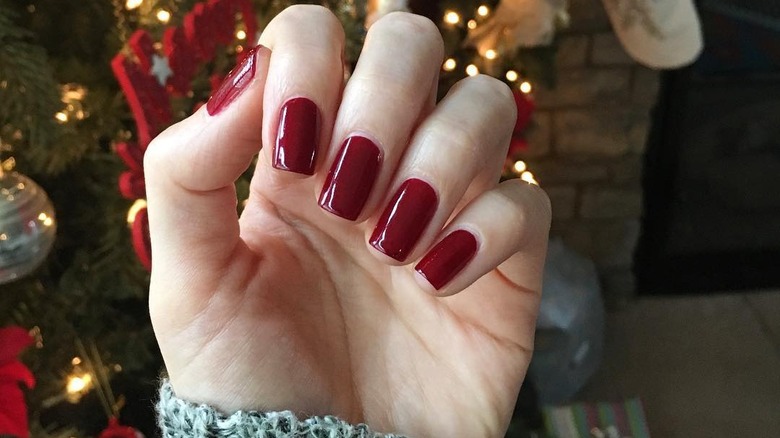 Burgundy manicure cozy sweater cuff