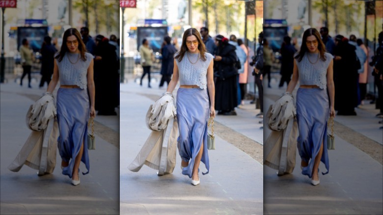 woman wearing a lavender lace top and slip skirt