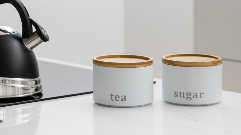 Tea and sugar on countertop