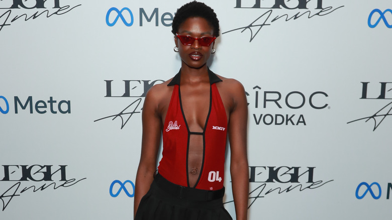 woman posing in halter top