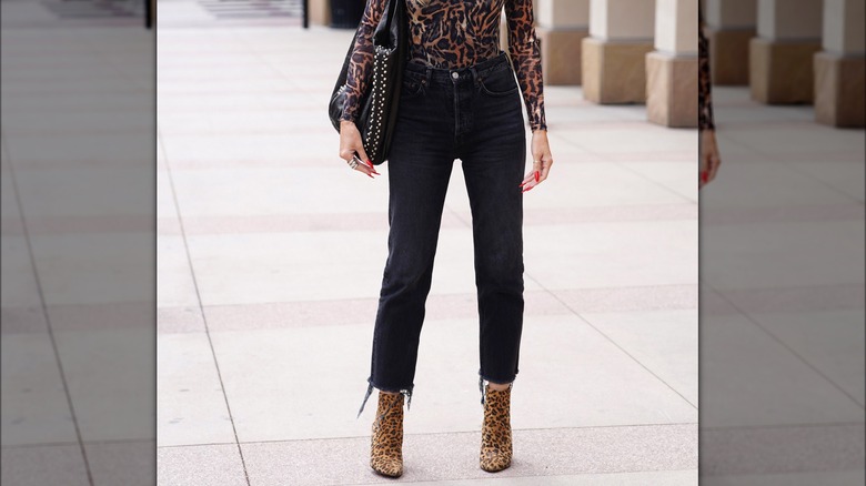 Cropped black jeans with animal print booties