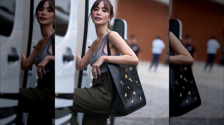 Woman holding tote bag