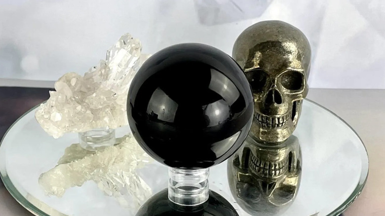 black obsidian crystal on white background