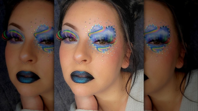 A woman with a blue makeup look