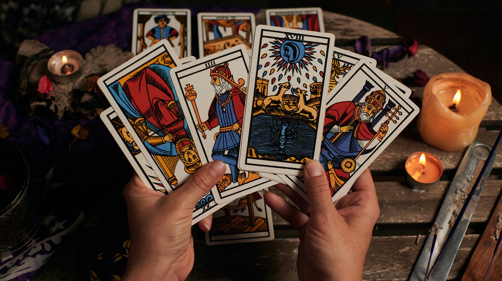 Cups, Wands, Swords, And Pentacles: What The Suits Of Tarot