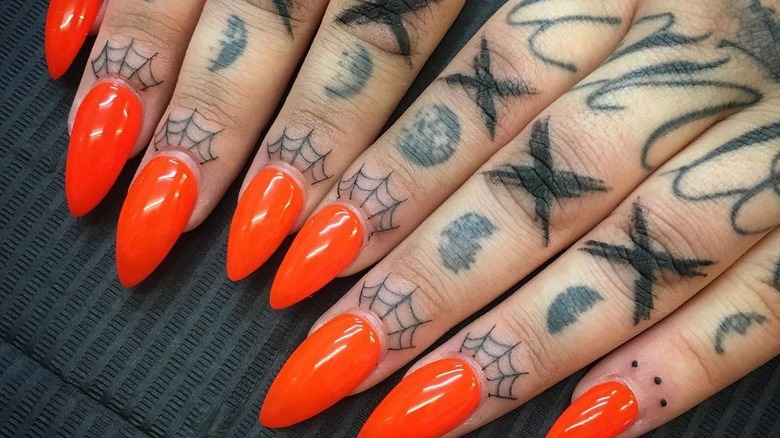 spider web cuticle tattoos