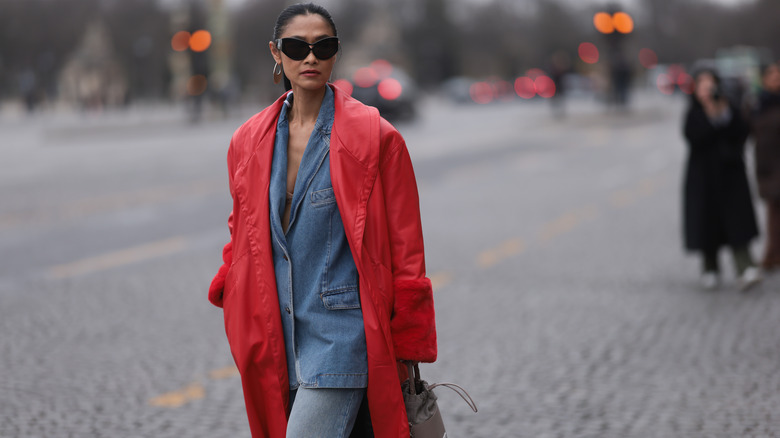 woman in long red coat