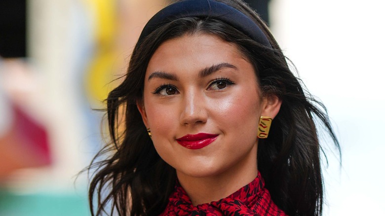 Woman wearing dark red lipstick