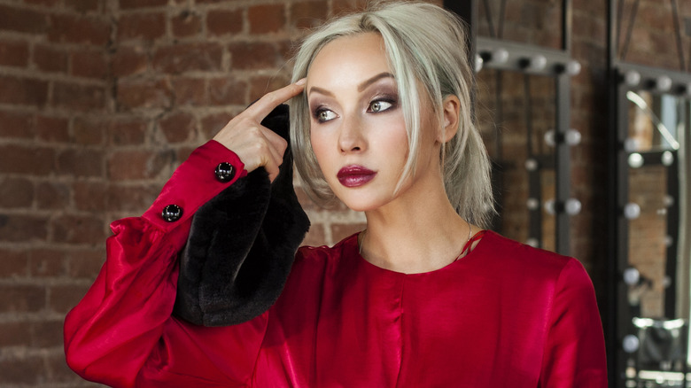 Woman red top, red lipstick