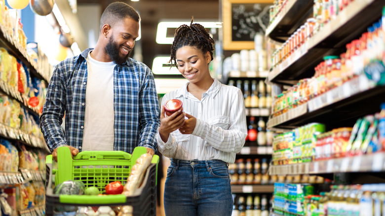 couple grocery shopping together