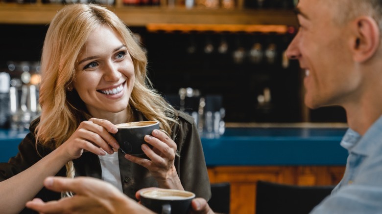 Man and woman having coffee