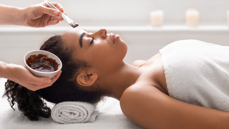 woman getting facial treatment