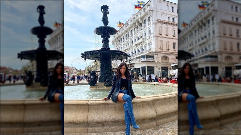 Woman in thigh-high denim boots