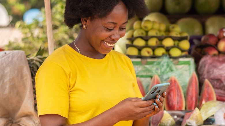 female shopper looking at her phone