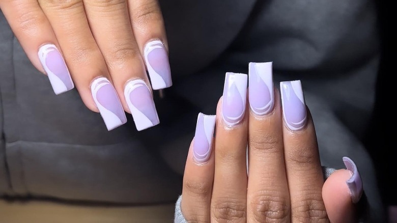 hand with digital lavender nail art