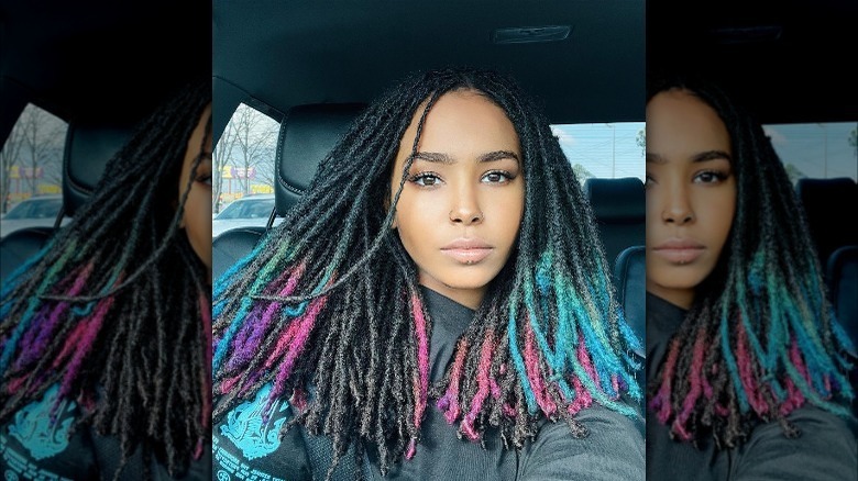 Locs with punk, blue, and purple dip dye