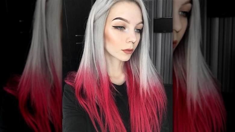 Woman with red dip dye hair