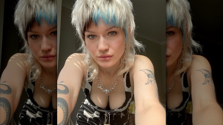 Blonde mullet with blue and black bangs