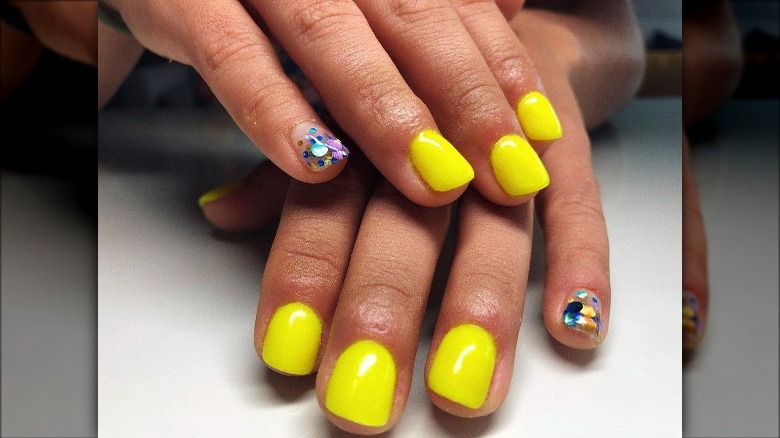 neon yellow dip nails 