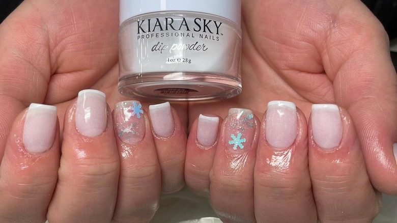 white manicure with snowflake decal 