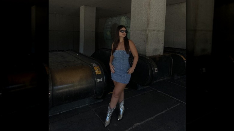 Woman wearing metallic cowgirl boots