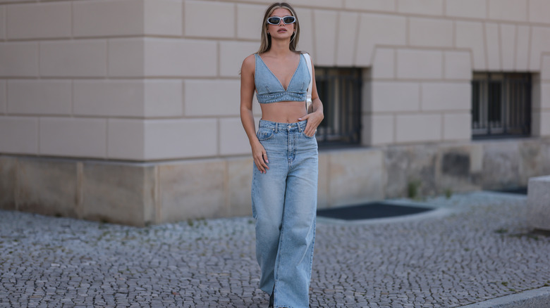 Woman wearing wide-leg high-waist jeans