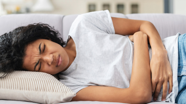 woman experiencing severe period cramps