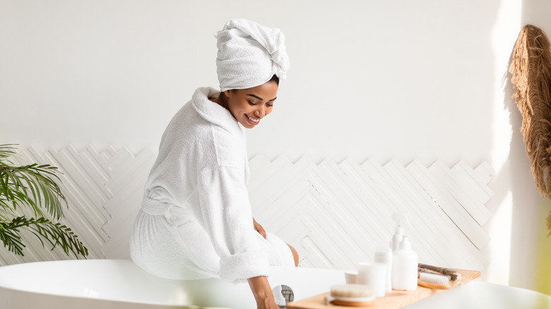 woman preparing bath