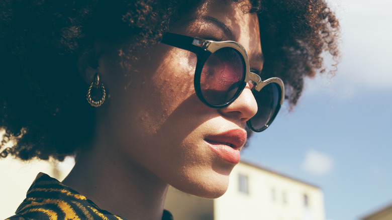 close up of woman wearing sunglasses