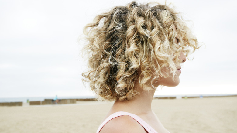 Woman with short curly bob